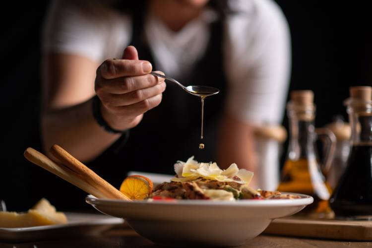 chef finishing a dish